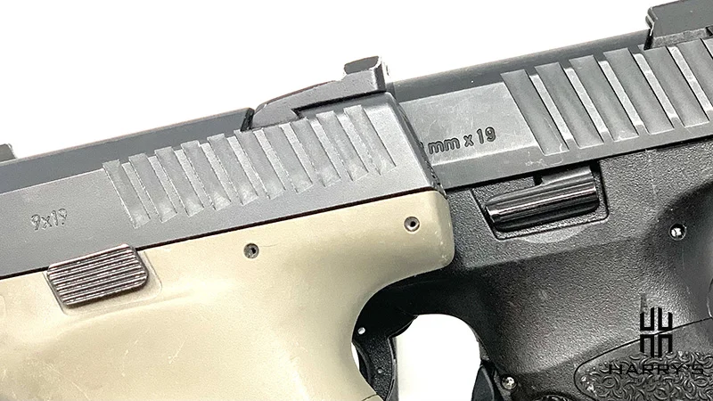 A photo of slide locks on CZ P10c vs HK VP9SK