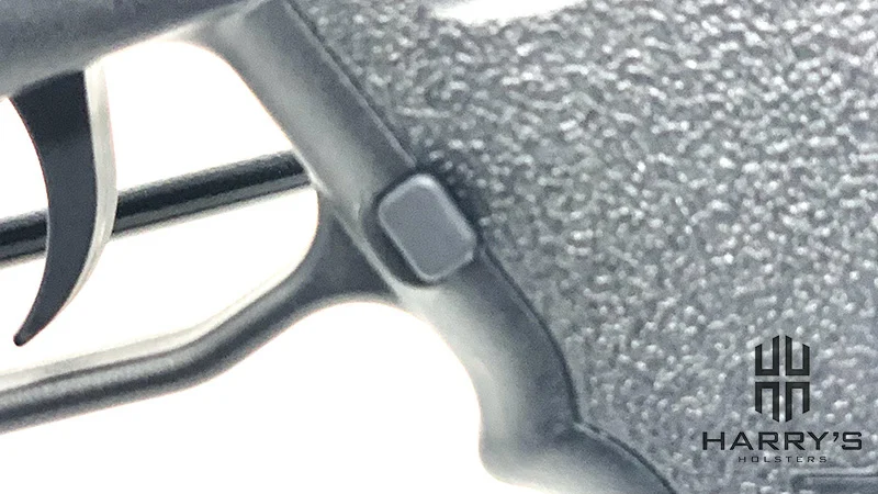 Sccy CPX2 Red Dot Magazine Release