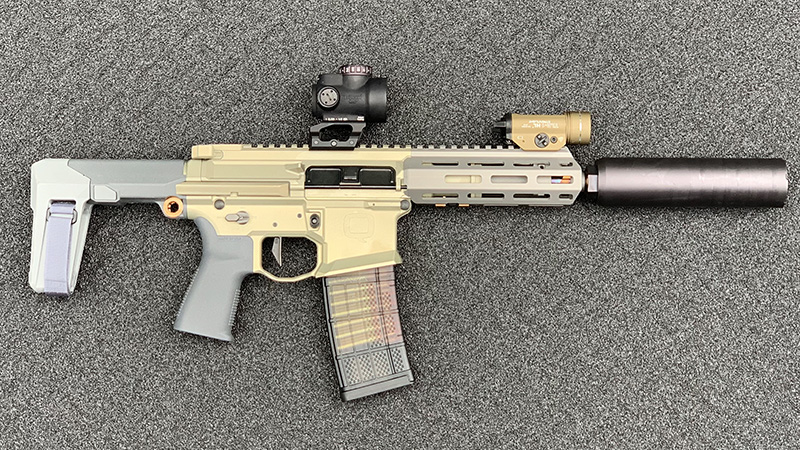 Honey Badger Pistol Collasped Right Suppressed