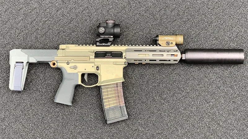 Honey Badger Pistol Collasped Right Suppressed