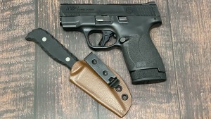 M_P Shield Plus Review Shaw Blade Sheathed