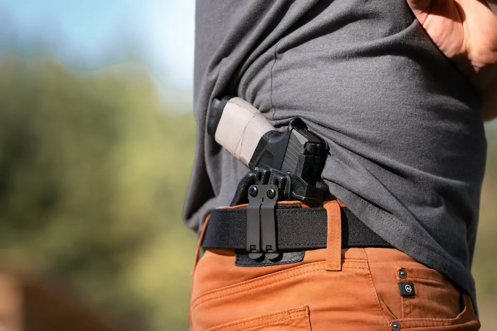 Sig P365X Macro behind the hip at the range